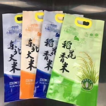 滨科求购 东北大米通用手提袋  五常稻花香大米塑料手提袋 通用橘色绿色蓝色手提大米袋10斤装  **从优